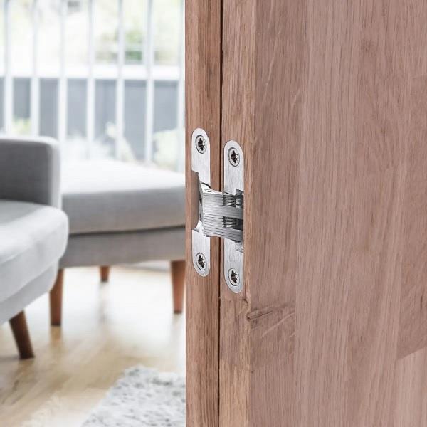 Two high-quality invisible cross hinges, 95 x 19 mm, made of Zamak, with a stainless steel look, including screws. Concealed furniture hinge from UMAXO®, folds 180°. Furniture hinge (vici hinge) for flush mounting.